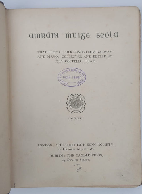Open book with title page displaying text and a logo on a white background
